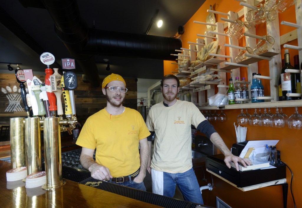 Emmett Soldati, left, and Aidan Watson are two of the three owners of Leaven Beer & Bread House in Somersworth, N.H. Patrick Jackman is the third of the trio that returned from far-flung points and career paths to open Leaven.