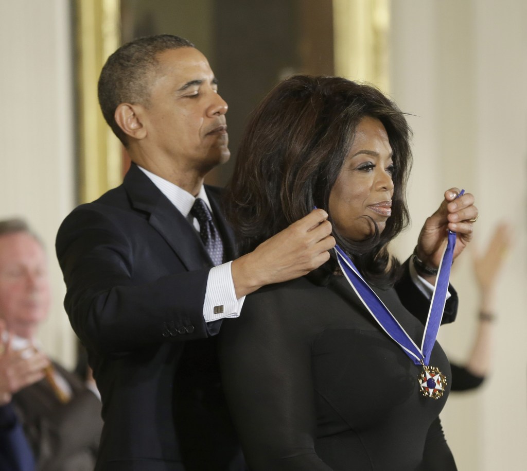 President Barack Obama awards Oprah Winfrey the Presidential Medal of Freedom.