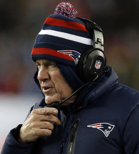 Patriots Coach Bill Belichick was bundled up along with everyone else Sunday night at a frigid Gillette Stadium.