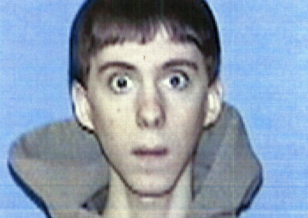This undated file identification photo released Wednesday, April 3, 2013 by Western Connecticut State University in Danbury, Conn., shows former student Adam Lanza, who authorities said opened fire inside the Sandy Hook Elementary School in Newtown, Conn., on Friday, Dec. 14, 2012, killing 26 students and educators. Investigators released a report on the shooting Monday, Nov. 25, 2013, by the prosecutor overseeing the probe, State’s Attorney Stephen Sedensky III.