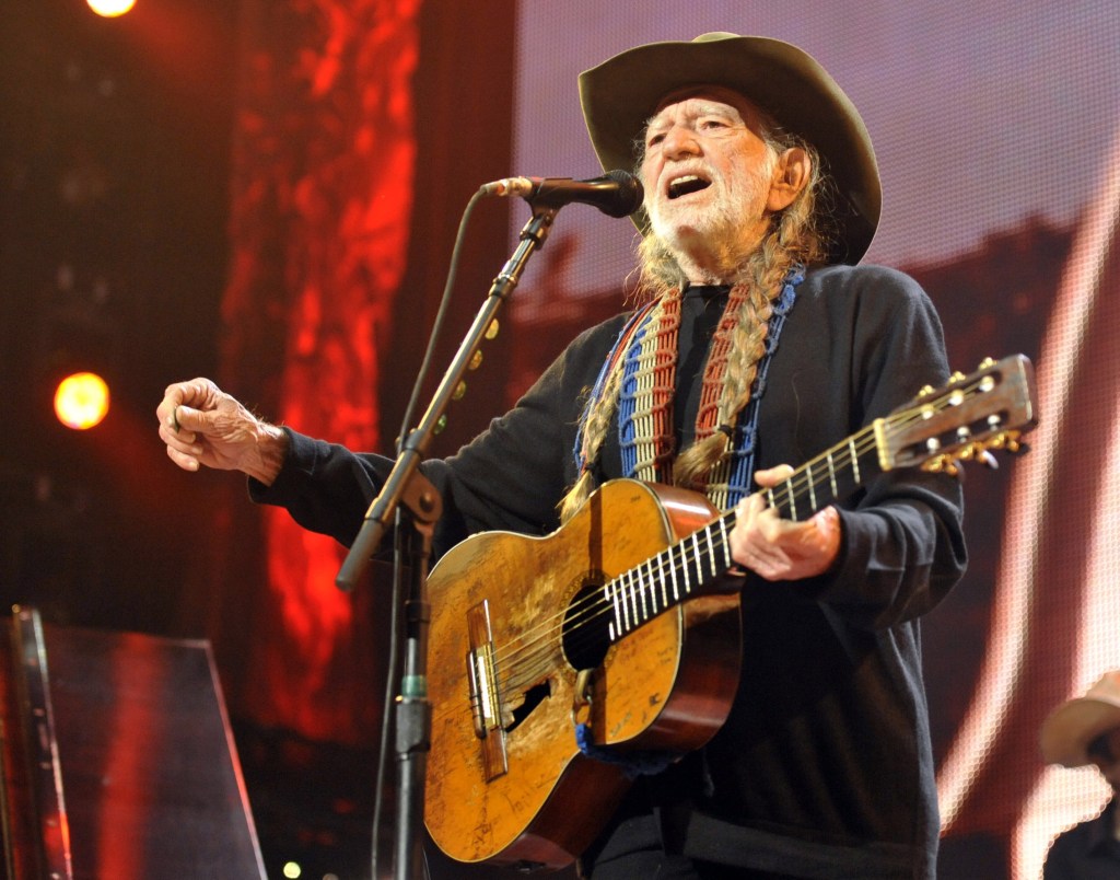 Willie Nelson had to suspend his tour indefinitely after three members of his band were hurt when their bus plowed into a bridge pillar early Saturday morning.