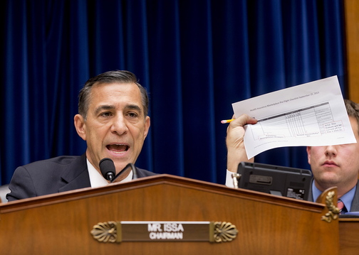 House Oversight Committee Chairman Rep. Darrell Issa, R-Calif., holds up a checklist related to the implementation of the HealthCare.gov website, during a hearing on Capitol Hill Wednesday. Issa wanted to know why the administration required consumers to first create online accounts before they could shop for health plans, a decision that runs counter to the common e-commerce practice of allowing anonymous window-shopping.