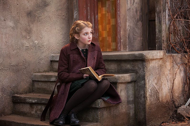 Sophie Nelisse stars as a girl who finds solace by stealing books and sharing them with others amid the horrors of World War II Germany in "The Book Thief."