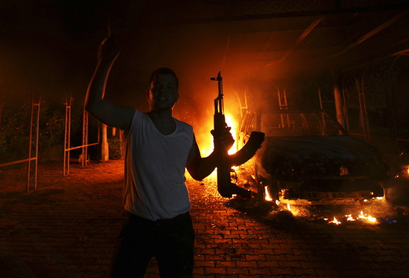 The U.S. Consulate in Benghazi is seen in flames during an attack by an armed group on Sept. 11, 2012.