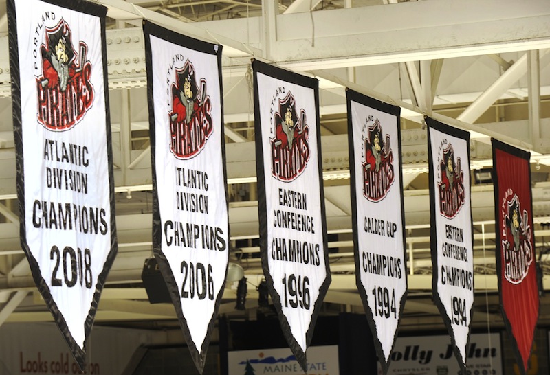 In this March 2010 file photo, the Portland Pirates' championship banners hang from the rafters at the Cumberland County Civic Center. An attempt to get the Civic Center’s trustees to resume lease negotiations with the Portland Pirates fell flat recently, so the Portland Community Chamber of Commerce President is trying another tack: replace the trustees.