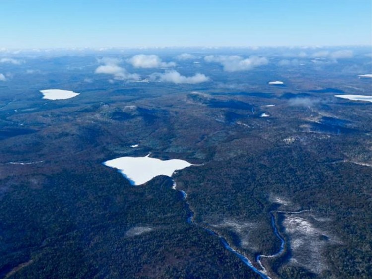 Bald Mountain, with Greenlaw Pond in the foreground, is the site of mineral deposits that Irving, which owns the property, would like to mine. The state Board of Environmental Protection has proposed new rules that would make it easier for mining companies to operate in Maine. <em>Photo courtesy of Courtesy of Natural Resources Council of Maine</em>