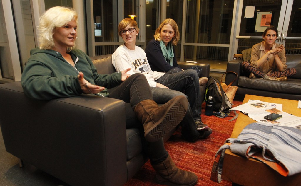 Joss Ferguson, left, discusses preferred gender pronouns with other members of Mouthing Off!, a group for students at Mills College in Oakland, Calif., who identify as gay, lesbian, bisexual or transgender.