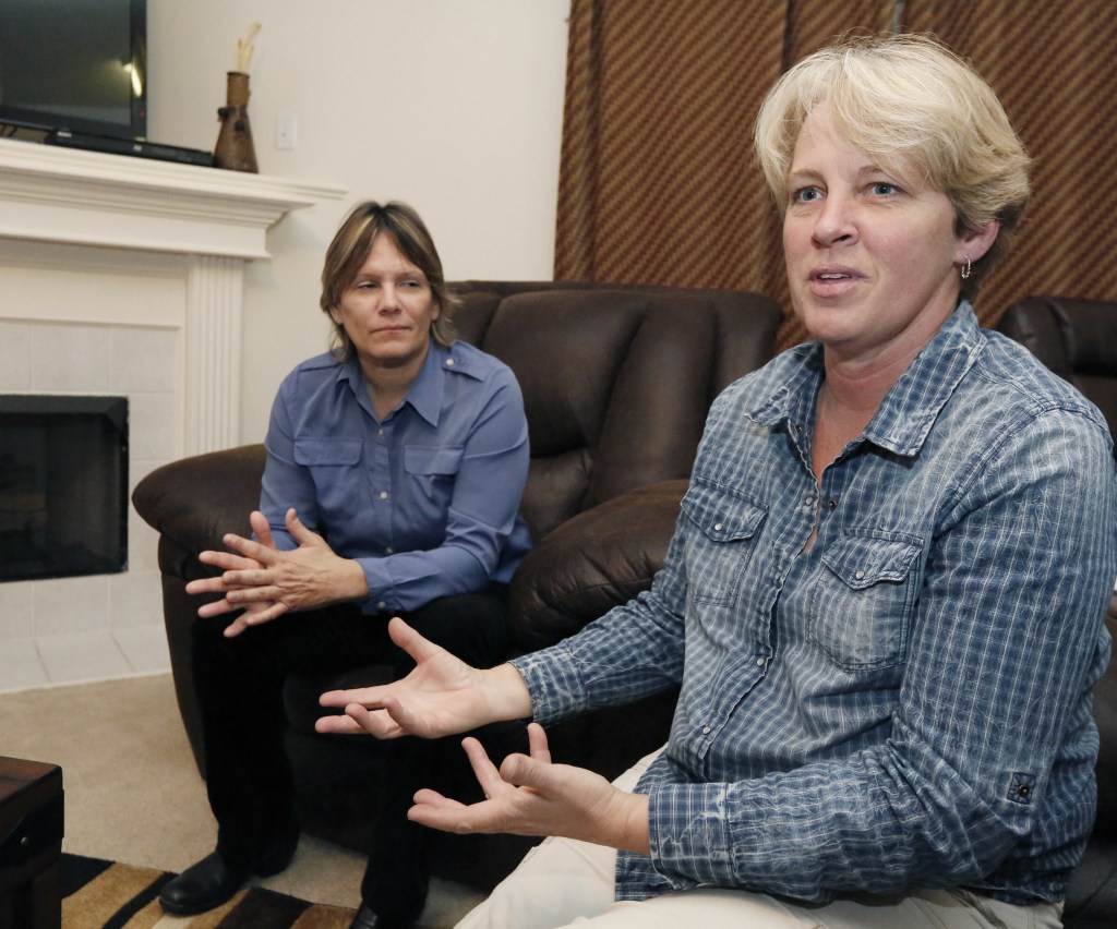 Dawn Jefferies, right, speaks about the efforts Lauren Czekala-Chatham, left, has taken to get Mississippi to recognize a same-sex marriage performed in California, so she can now divorce the partner she lived with until 2010 in DeSoto County.