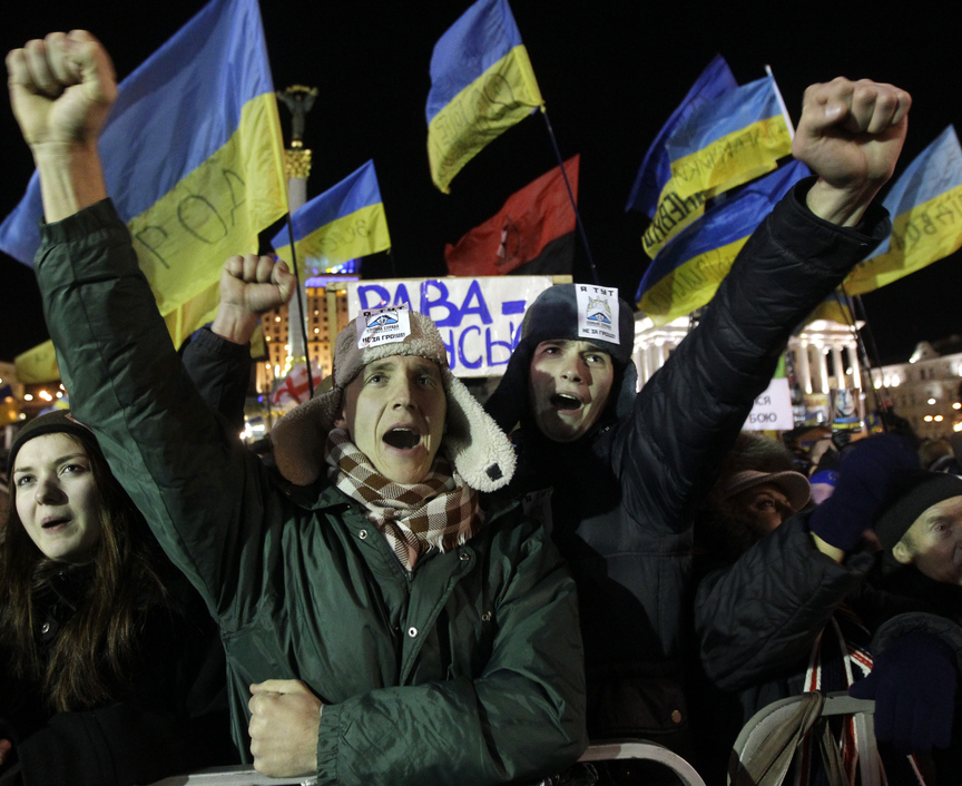 Protesters shout slogans during a rally at Independence Aquare in Kiev, Ukraine, on Tuesday after a no-confidence vote in the country’s parliament failed.