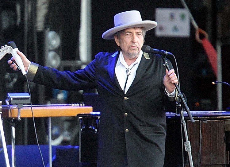 IN this file photo, Bob Dylan performs at “Les Vieilles Charrues” Festival in Carhaix, western France, in this July 2012 photo. 