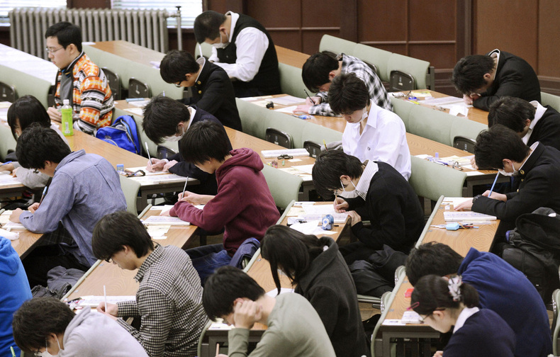 Students sit for a university admission test in Tokyo last January. Students from Shanghai, Hong Kong, Singapore, Taiwan, Japan and South Korea were among the highest-ranking groups in math, science and reading test results released Tuesday.