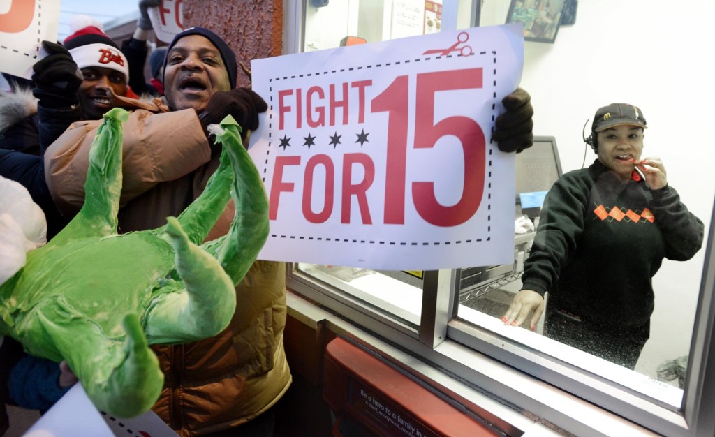 Demonstrators rally for better wages outside a McDonald’s restaurant in Chicago on Thursday. Demonstrations planned in 100 cities were part of push by labor unions, worker advocacy groups and Democrats to raise the federal minimum wage of $7.25.
