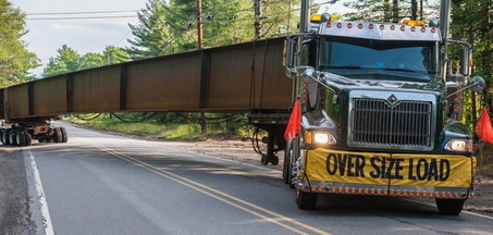 ARC Enterprises, a manufacturer of steel bridge beams in Kingfield is delivering shipments of sheets of steel, some as large as 85 feet long by 10 feet wide, via truck from South Portland, a distance of 90 miles.