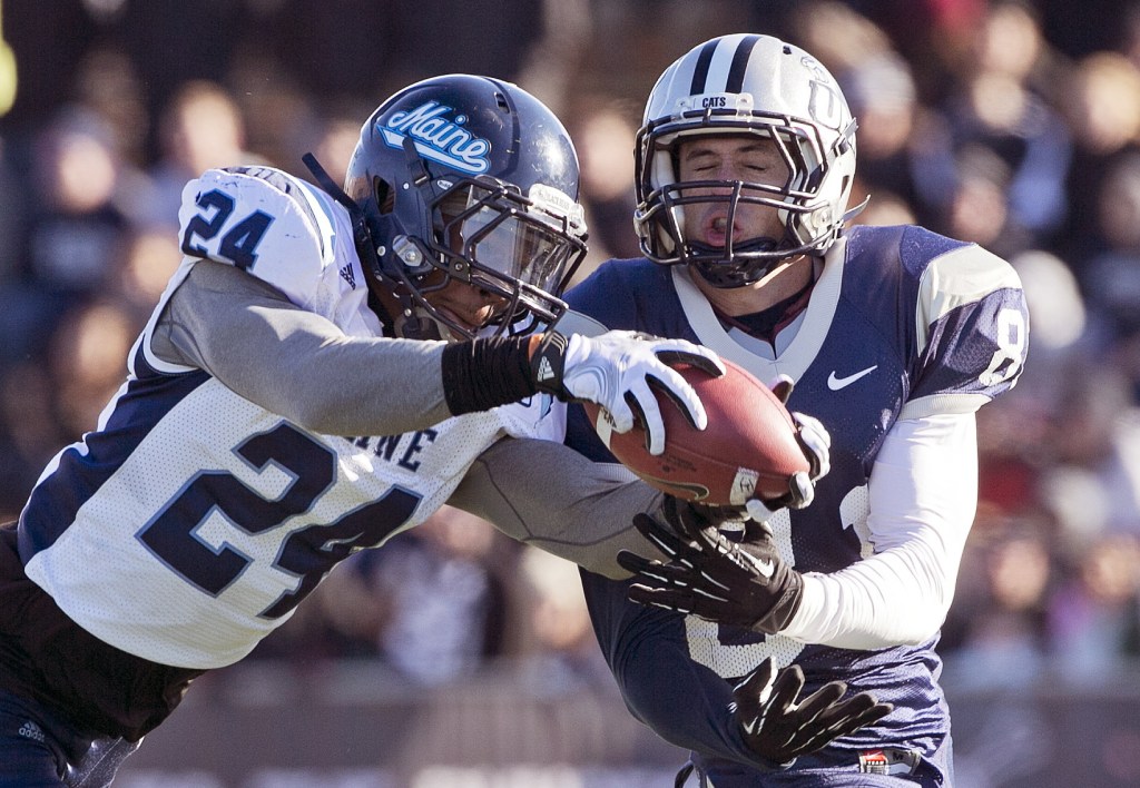 Maine defensive back Khari Al-Mateen, shown vying for a pass, may have made the Black Bears’ most critical play of 2013 when his 41-yard run on a fake punt changed momentum in a game against Villanova.