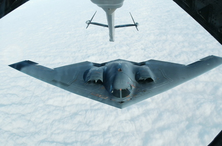 A B-2 Spirit stealth bomber approaches an Air Force KC-10(A) tanker plane over Missouri to receive an aerial refueling after taking off from Whiteman Air Force Base in Missouri in 2002 .