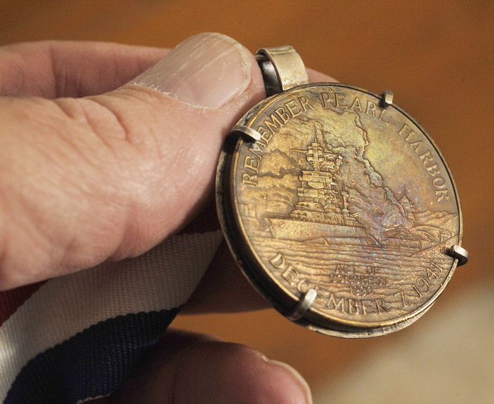 A medal commemorating the Pearl Harbor attack on Dec. 7, 1941 belonged to Bert Davis.