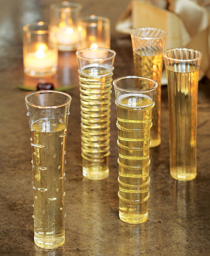 Champagne flutes from Olive & Cocoa are studded with dots, swirls and stripes.