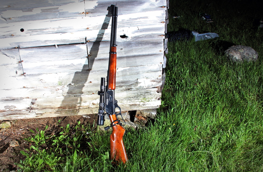 Police investigators say James Reynolds stole this .35-caliber, lever-action Marlin hunting rifle and pointed it at Trooper Jason Wing in a confrontation last June. Only after the shooting did police learn that the rifle was unloaded and the lever was secured with a cable lock.