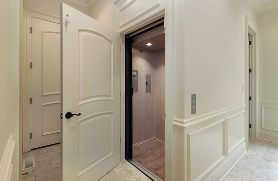 Elevators are being added to suburban mansions and to urban townhouses. Installing one costs about $25,000.