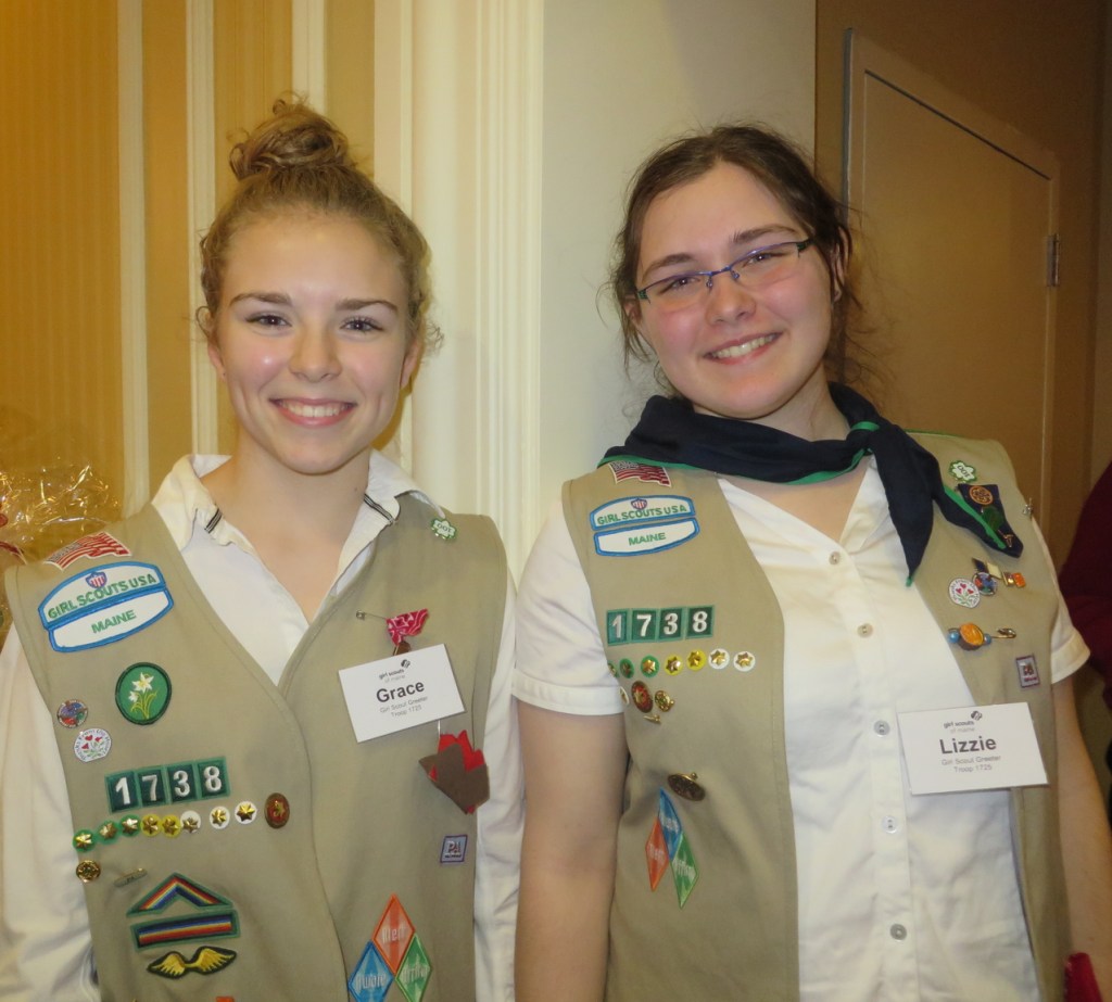 High school juniors Grace Conant of Westbrook and Lizzie Kane of Gorham show their Girl Scout colors.