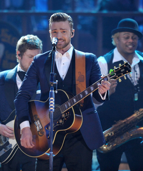 FILE - In this Nov. 24, 2013 file photo, Justin Timberlake performs on stage at the American Music Awards at the Nokia Theatre L.A. Live in Los Angeles. Timberlake was among the top nominees for the 56th annual Grammy Awards announced Friday night, Dec. 6, 2013.