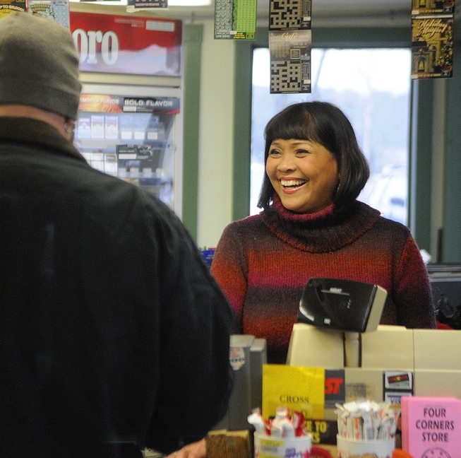 Vicky Staszewski works behind the counter at Four Corners General Store in West Gardiner on Thursday. The store’s customers have donated items for Staszewski’s family members in the Philippines.