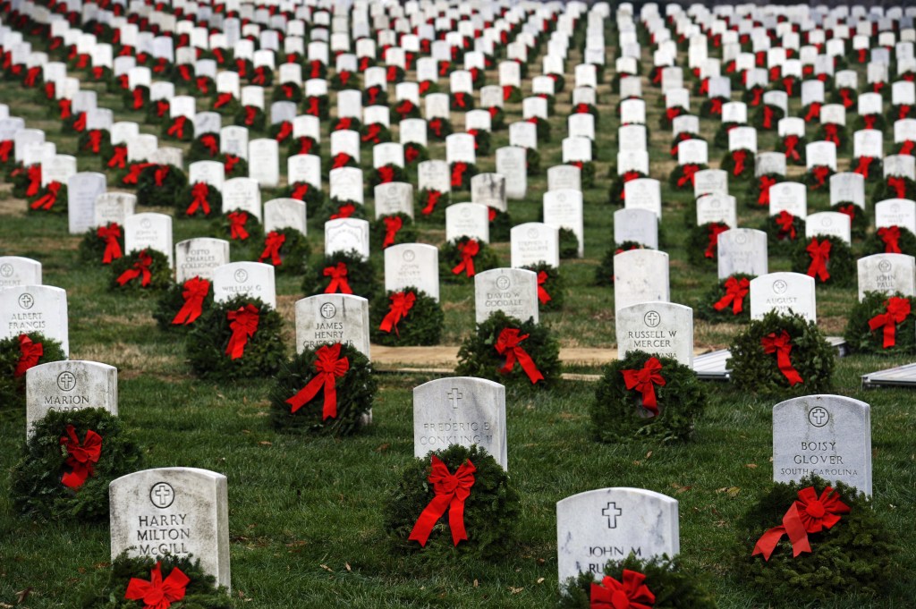 Wreaths donated by Worcester Wreath Company of Harrington, Maine, are placed next to headstones at Arlington National Cemetery in Arlington, Va., in this 2010 photo.