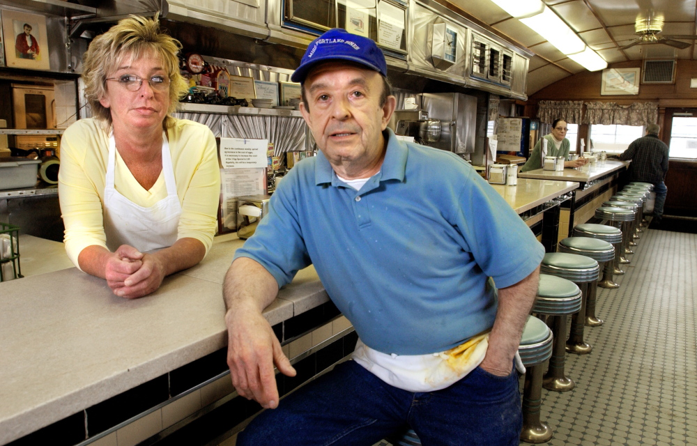 Randall Chasse and his manager, Mary Barnes, are shown in the Miss Portland diner in Portland in 2004, the year he donated it to the city. He later owned and operated the Middle Street Cafe.