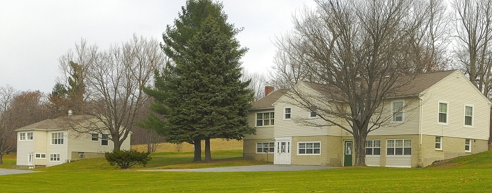 This photo taken in November on Arsenal Heights in Augusta shows two of the four former group homes that could become temporary housing for those who no longer need the level of care provided at Riverview Psychiatric Center. The four houses on the former Augusta Mental Health Institute campus are near the Kennebec Arsenal on the east side of Augusta.