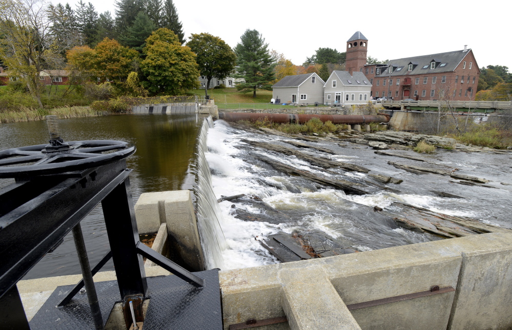 Water from the Royal River flows over the Bridge Street dam in Yarmouth, one of two dams the town is considering removing. A recent op-ed doesn’t give enough credence to concerns that dam removal could wash toxins into Yarmouth Harbor, a reader says.