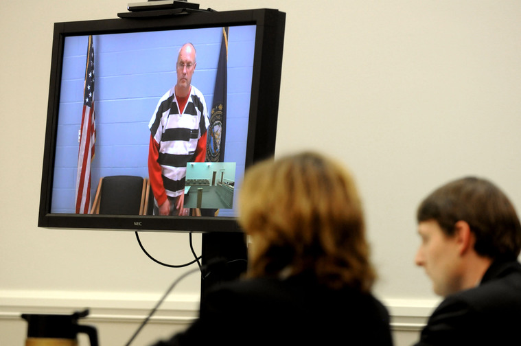 Robert J. Dellinger, 53, of Sunapee, N.H., is arraigned by video at Lebanon District Court in Lebanon, N.H., on Wednesday, on two counts of manslaughter in the deaths of a Wilder, Vt., couple who were killed in an automobile collision on Interstate 89 in Lebanon on Saturday.