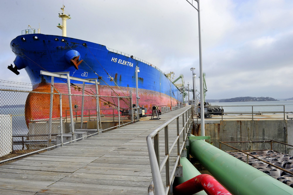 A tanker unloads at the Portland Pipe Line facility earlier this year. If a reversal is allowed, the 236-mile underground pipeline could be used to transport so-call tar sands crude from reserves in the province of Alberta to South Portland.