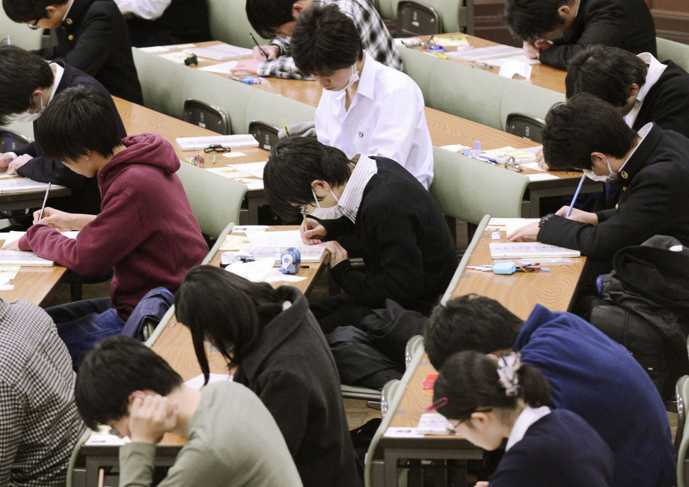 Japanese teenagers take college entrance exams at the University of Tokyo in January. Asian students had some of the highest scores on the international standardized PISA tests, but a reader questions the value of the tests “as some sort of measure of national strength.”