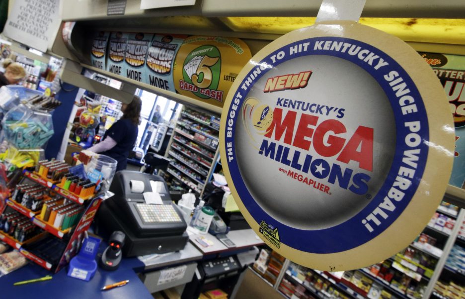 A woman buys lottery tickets at the One Stop store, Thursday, Dec. 12, 2013, in Newport, Ky. Friday’s Mega Millions drawing has an estimated jackpot of $400 million.