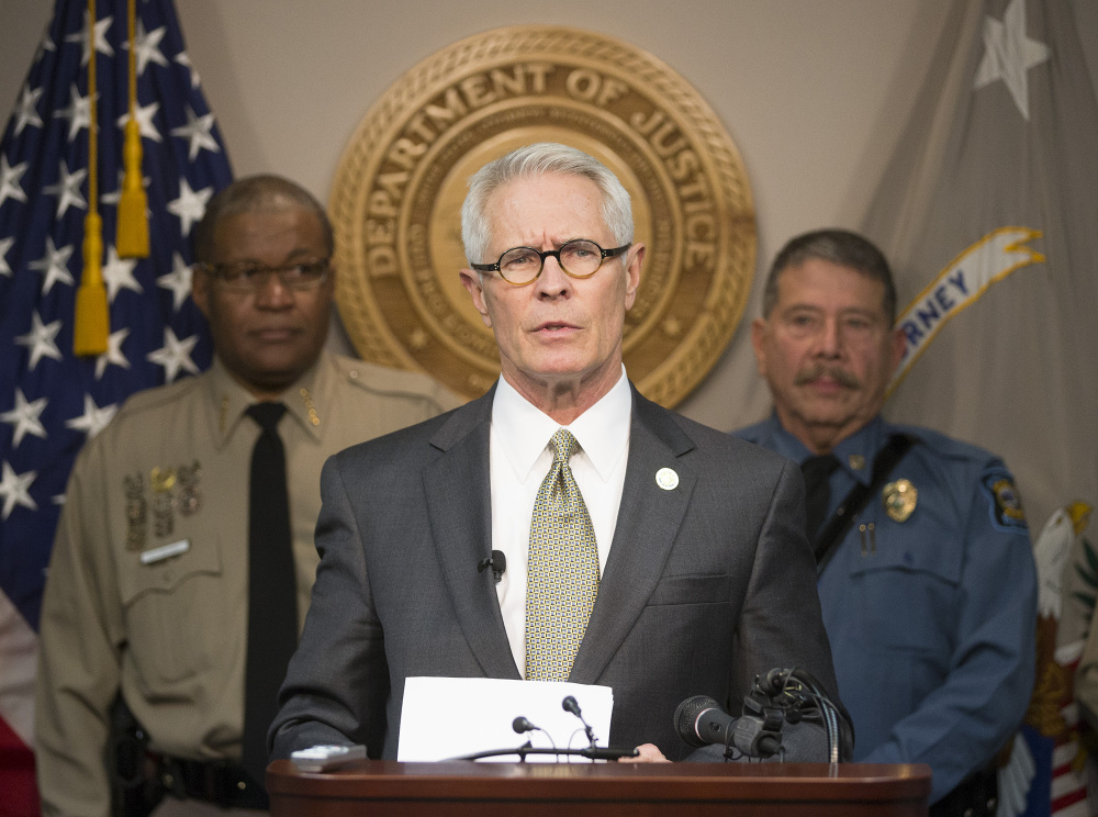 U.S. attorney Barry Grissom announces the arrest of Terry Lee Loewen, 58, of Wichita, Kansas., during a news conference . Grissom said Loewen was arrested Friday morning at Mid-Continent regional airport where he planned to drive a car that he believed was full of explosives into a terminal at the airport.