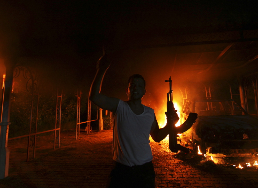 The U.S. Consulate in Benghazi is seen in flames on Sept. 11, 2012. CIA officials testified this week that a fear of ambush with no backup delayed the agency’s response to the attack.