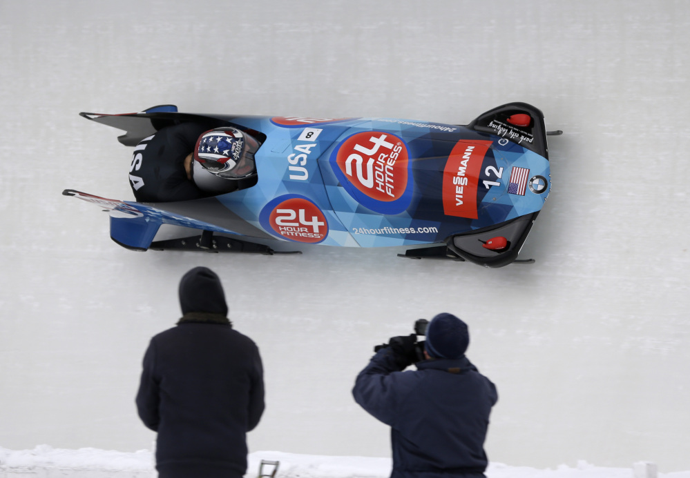 United States’ pilot Nick Cunningham and brakeman Johnny Quinn compete in the two-man bobsled World Cup event Saturday in Lake Placid, N.Y. The pair finished second.