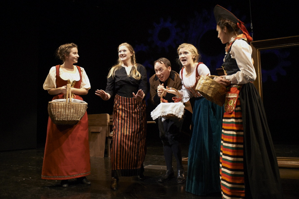 Villagers exclaim over the first snowfall in a scene from the Portland Stage Company production of the Hans Christian Andersen fairytale "The Snow Queen" continuing through Dec. 22