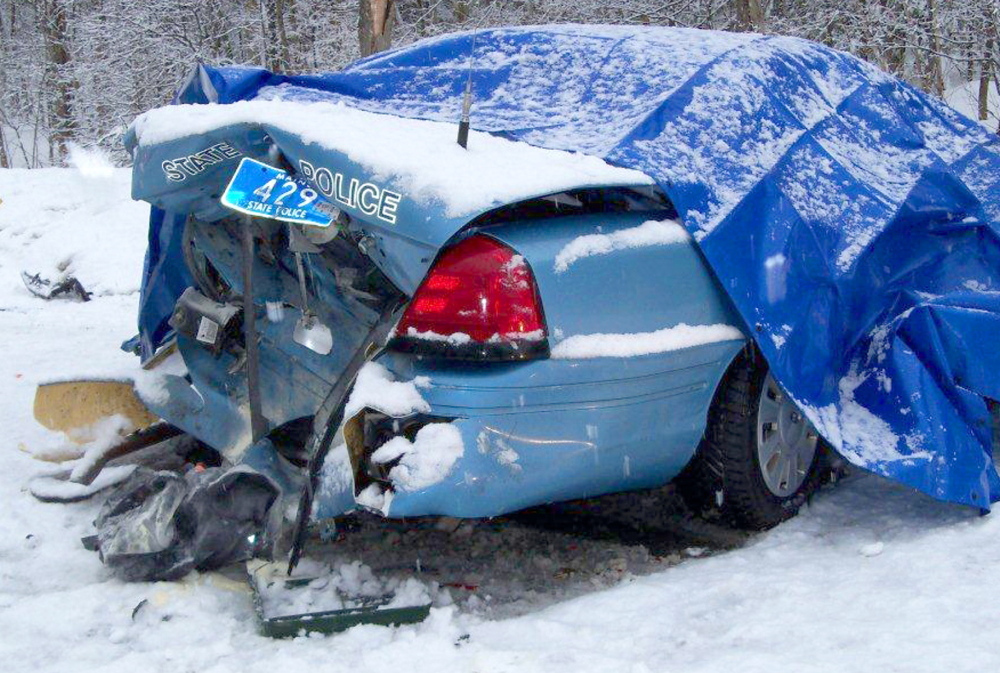 State Trooper Robert Cjeka was trapped in 2011 after being his cruiser was rear-ended in Livermore Falls. Police are urging motorists to slow down and move over when approaching emergency vehicles.
