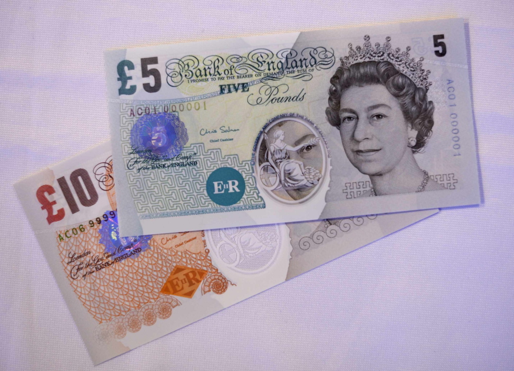 Examples of polymer banknotes are displayed at the Bank of England, in London, on Wednesday.