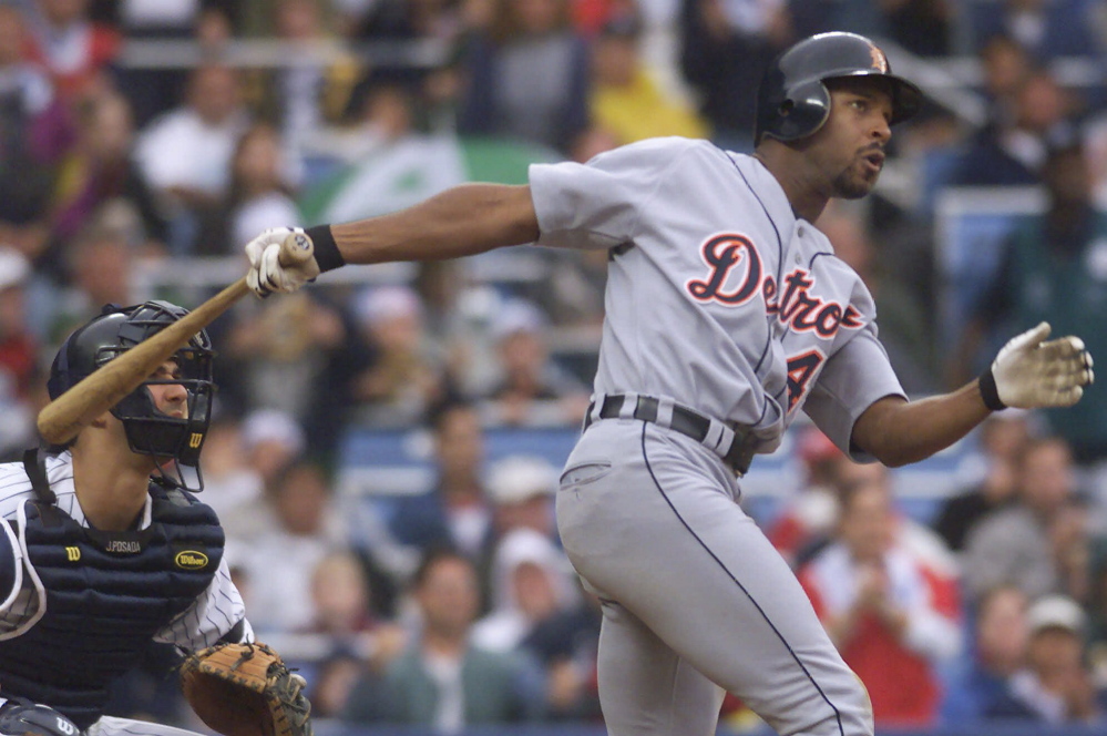 Billy McMillon, when he played for the Detroit Tigers, hits a grand slam in 2000 in New York. McMillon spent parts of six seasons in the Major Leagues.