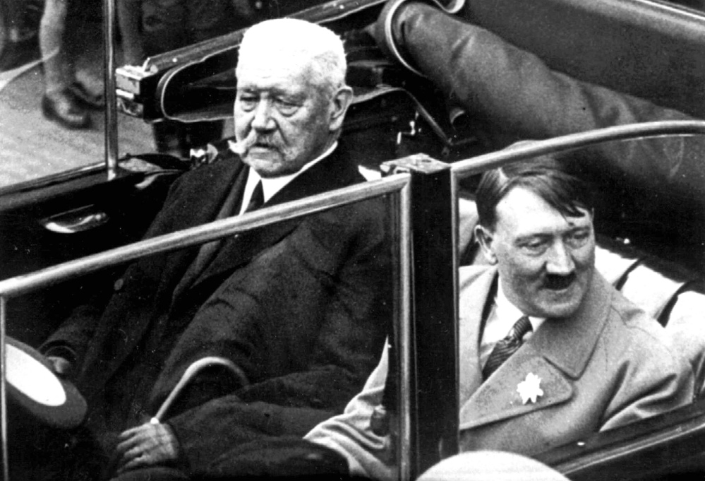 German President Paul von Hindenburg, left, and Adolf Hitler, right, in 1933. AP Photo