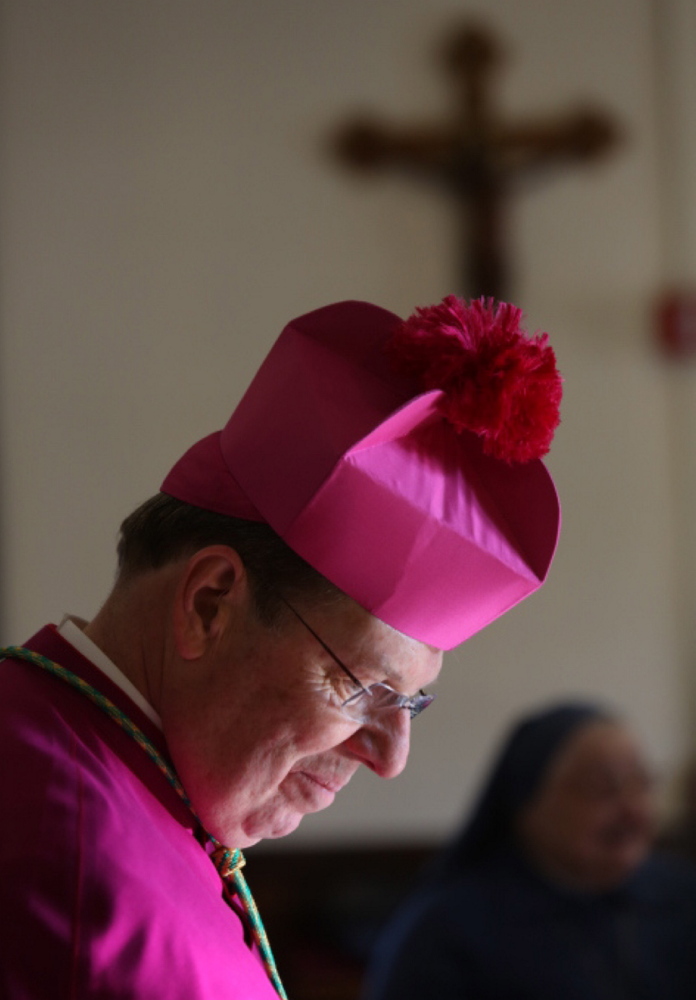 The Rev. Robert P. Deeley wears a biretta after his ordination by Cardinal Seán O’Malley as an auxiliary bishop last January at the Cathedral of the Holy Cross in Boston.