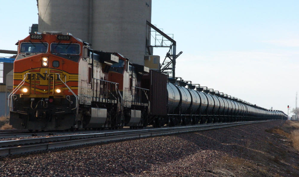 A BNSF Railway train hauls crude oil west of Wolf Point, Mont. As common as the mile-long trains have become across the U.S. and Canada, dozens of officials in the towns and cities where they travel say they are concerned they are not adequately prepared to handle an emergency.