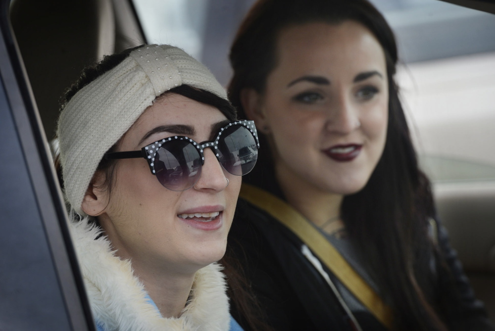 Mia DiGiovanni, left, with Ashleigh Burgess outside of Target in South Portland, said she used a debit card to make recent purchases at Target, but as of Thursday, Target had yet to notify her about the data breach.