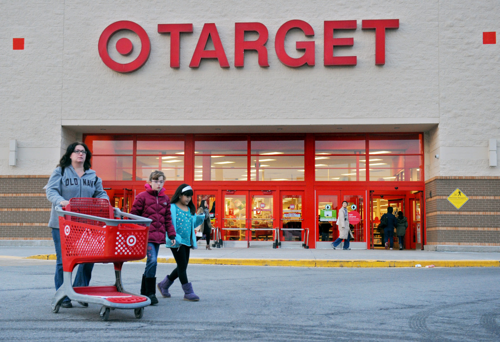 Shoppers leave a retail Target on Thursday in Hackensack, N.J. Target says that about 40 million credit and debit card accounts customers may have been affected by a data breach that occurred at its U.S. stores between Nov. 27 and Dec. 15.