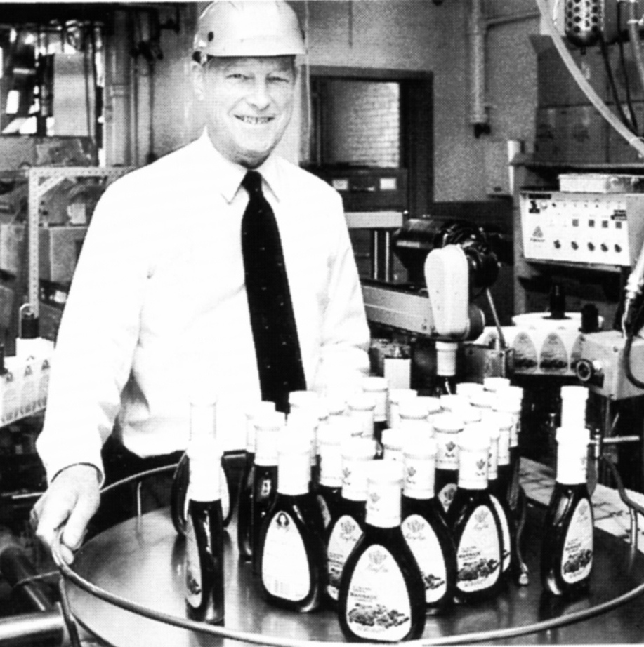 Richard Foss poses with some of the products made by the company he co-owned, Schlotter-beck & Foss. He was also active in First Parish Church of Portland.