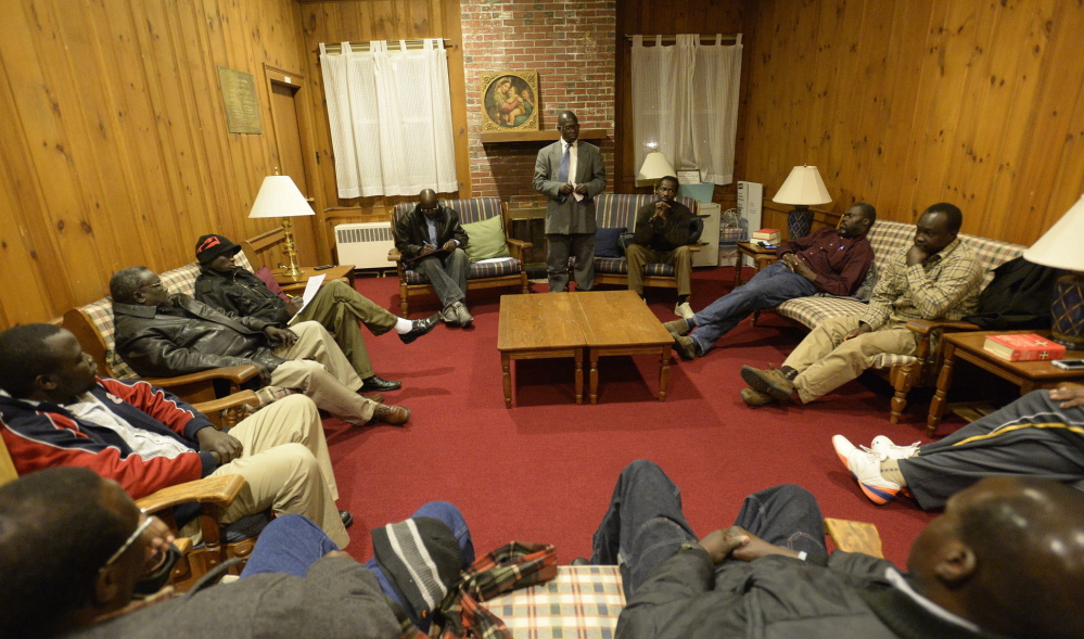 Sixteen elders of the Sudanese community in Maine discuss the unrest in South Sudan on Saturday.