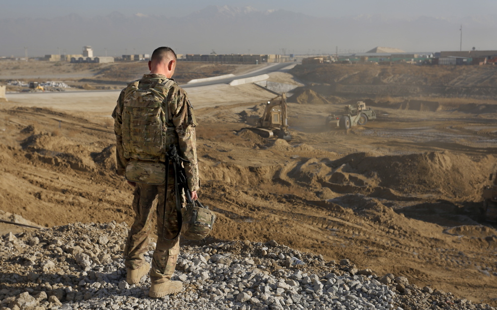 Staff Sgt. Jonathan Boubel of Durham takes a break at Bagram Air Field in Afghanistan on Friday. He is with the 133rd Engineer Battalion of the Maine Army National Guard, which is focused on the end of a military presence that dates back almost to 9/11.