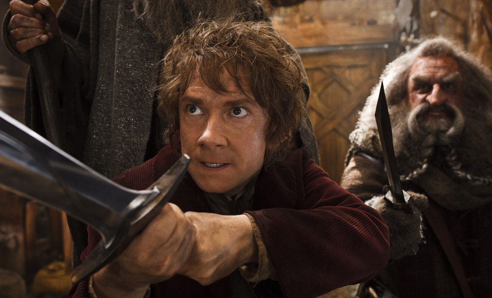 Martin Freeman, left, and John Callen star in a scene from “The Hobbit: The Desolation of Smaug.”